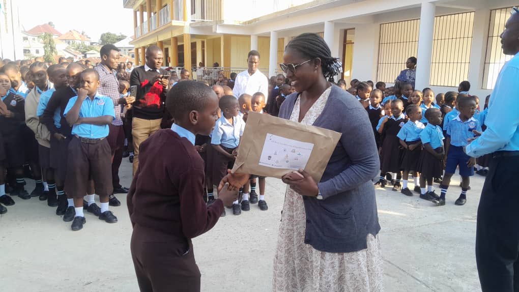 Lusasaro student with teacher